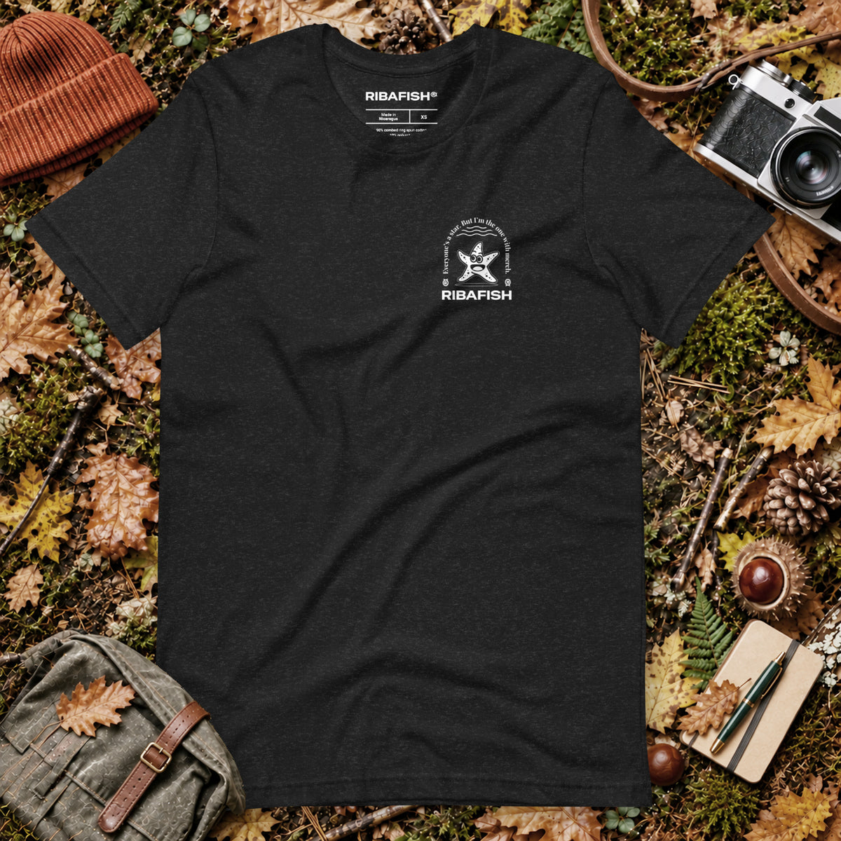 Everyone’s a star. But I’m the one with merch. / Unisex t-shirt / Black Heather